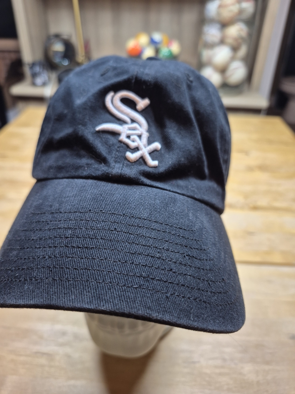 Black Baseball Cap with White Sox Embroidered Logo